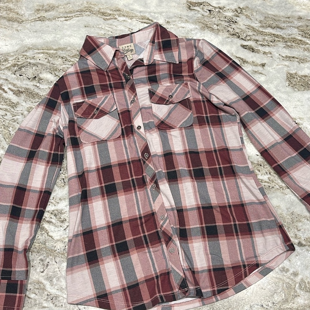 Women’s size small plaid button up shirt.